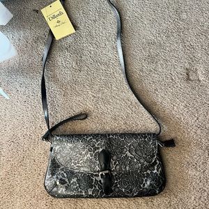 Limited edition Patricia Nash glittery leather purse from the Rose collection